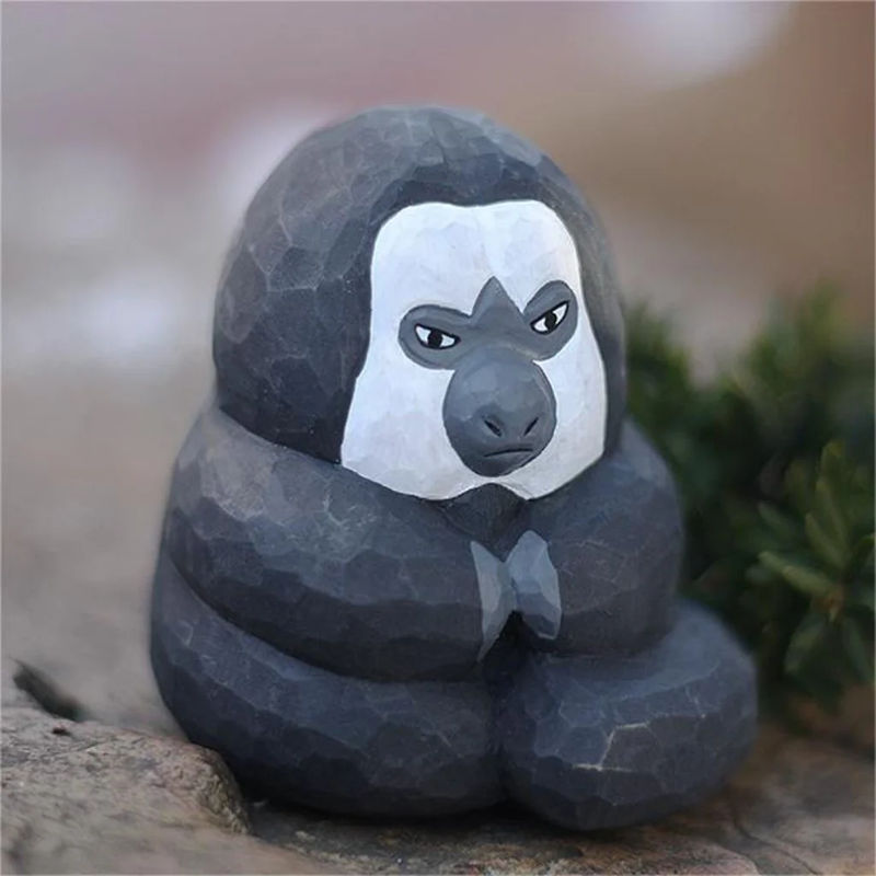 Hand-Painted Wooden White-Faced Saki Monkey Figurine – Exquisite Artisan Decor